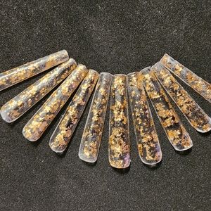 Clear with gold or silver flakes